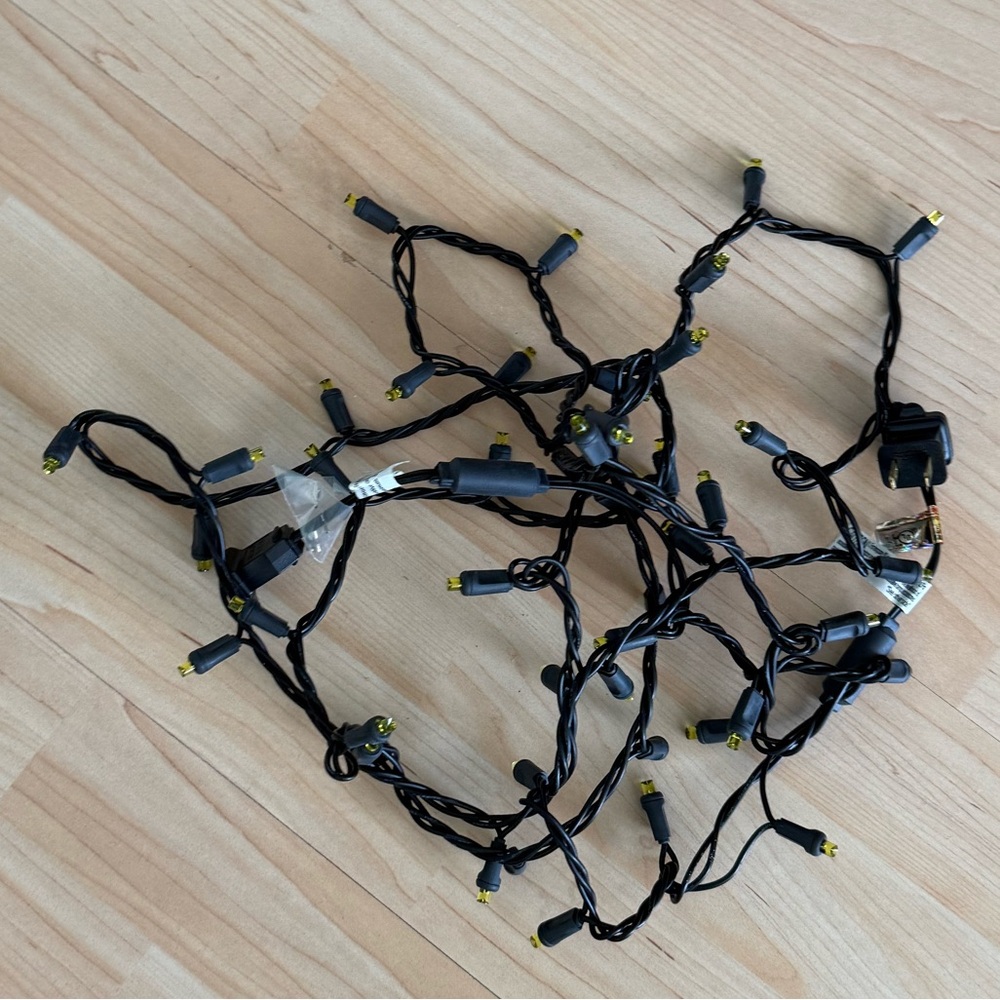 Festive Black String Lights with Yellow Tips